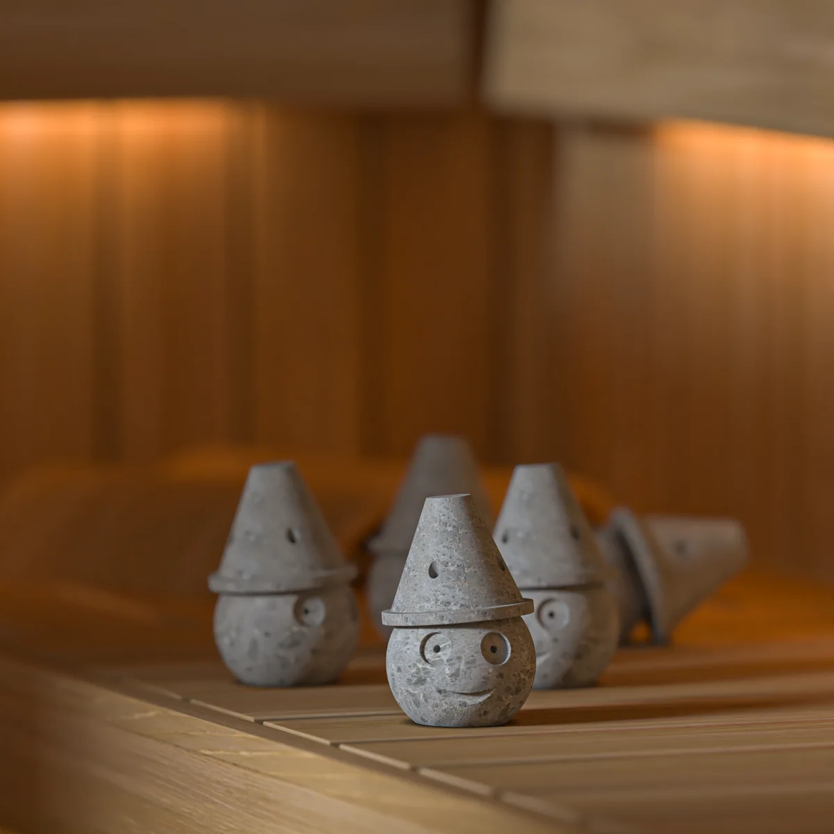 SAWO Kivistone Aroma Spirit Cups arranged on a sauna bench
