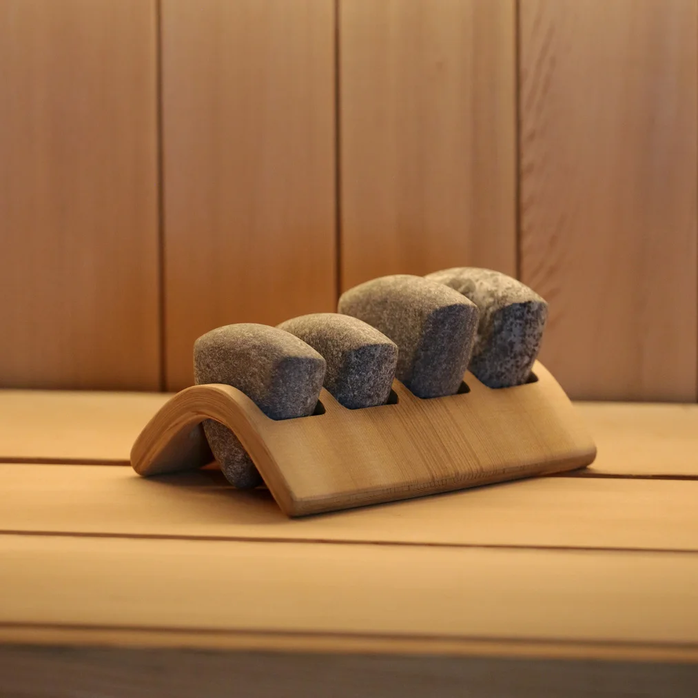 SAWO Kivistone Spa Stones Set on its cedar holder